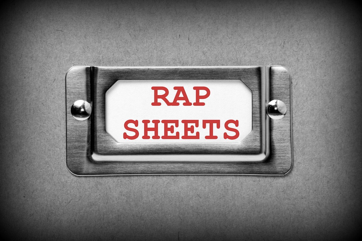 Cajón de archivo gris etiquetado 'Rap Sheets'