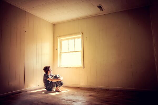 A Colorado child abuse victim, hungry and alone in a spare room. 