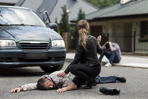 woman with man who was injured in car accident