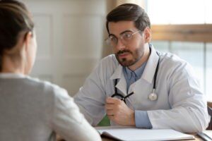 A physician listening to his patient.