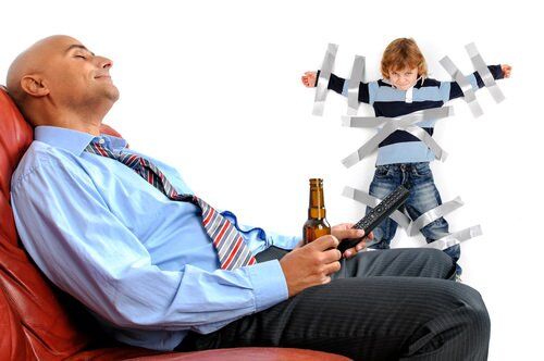 child duct taped to wall while parent lounges on a sofa and drinks beer